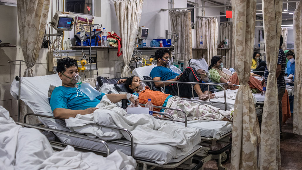 In the emergency ward of a hospital in New Delhi on May 3, patients relied on oxygen as they battled COVID-19. India’s health care system can’t keep up with the soaring case counts as the second wave of the coronavirus pandemic rages through the country. REBECCA CONWAY/GETTY IMAGES In the emergency ward of a hospital in New Delhi on May 3, patients relied on oxygen as they battled COVID-19. India’s health care system can’t keep up with the soaring case counts as the second wave of the coronavirus pandemic rages through the country. REBECCA CONWAY/GETTY IMAGES