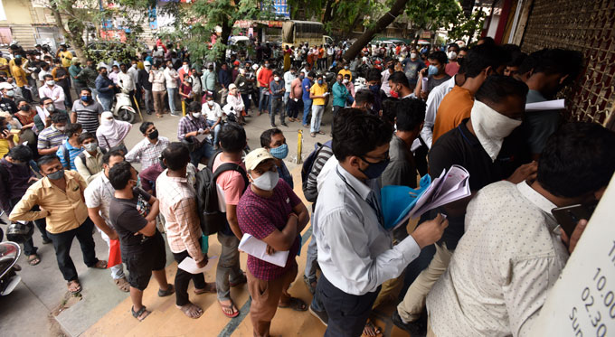 In early April, acute shortages of remdesivir in Pune hospitals resulted in long queues outside the Indian city’s pharmacies. Health officials blamed indiscriminate use of the antiviral drug for shortages in Pune and elsewhere. AP IMAGES In early April, acute shortages of remdesivir in Pune hospitals resulted in long queues outside the Indian city’s pharmacies. Health officials blamed indiscriminate use of the antiviral drug for shortages in Pune and elsewhere. AP IMAGES