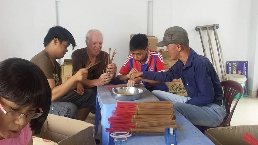 Keenan and the children make incense sticks at the centre. Keenan and the children make incense sticks at the centre.