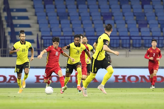 Vietnam hold off Malaysia for 2-1 win, moving closer to World Cup final qualifying round Vietnam hold off Malaysia for 2-1 win, moving closer to World Cup final qualifying round