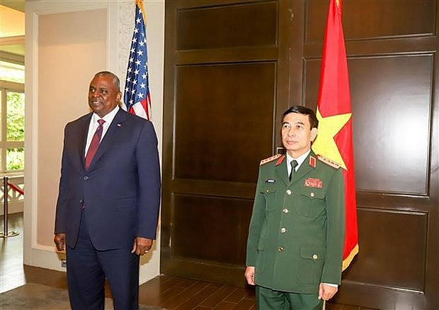 Defence Minister Gen. Phan Van Giang (R) and US Secretary of Defence Lloyd Austin (Photo: VNA) Defence Minister Gen. Phan Van Giang (R) and US Secretary of Defence Lloyd Austin (Photo: VNA)