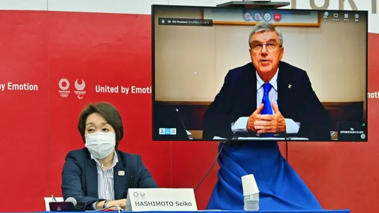 Tokyo 2020 President Seiko Hashimoto, left, holds a virtual meeting with International Olympic Committee President Thomas Bach. (Pool photo) Tokyo 2020 President Seiko Hashimoto, left, holds a virtual meeting with International Olympic Committee President Thomas Bach. (Pool photo)