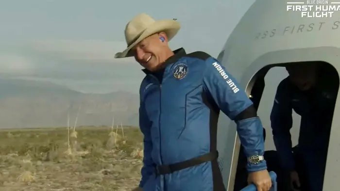Jeff Bezos leaves the capsule of the New Shepard craft after its flight on Tuesday © Blue Origin/AFP/Getty Jeff Bezos leaves the capsule of the New Shepard craft after its flight on Tuesday © Blue Origin/AFP/Getty