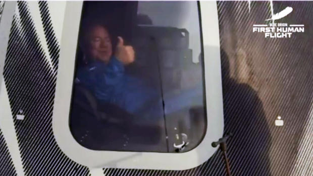 Jeff Bezos gives a thumbs-up inside the crew capsule moments after landing. BLUE ORIGIN Jeff Bezos gives a thumbs-up inside the crew capsule moments after landing. BLUE ORIGIN