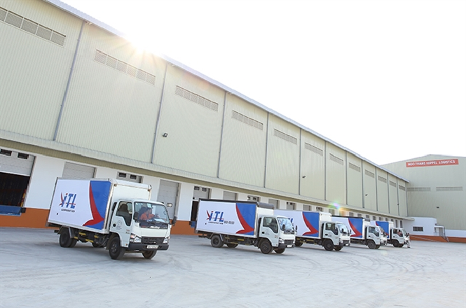 Indo Trans Logistics Corporation truckers at a warehouse facility. The logistics firm just won a US$ 70 million loan from the International Finance Corporation. — Photo ITL Corp. 2341 logistics