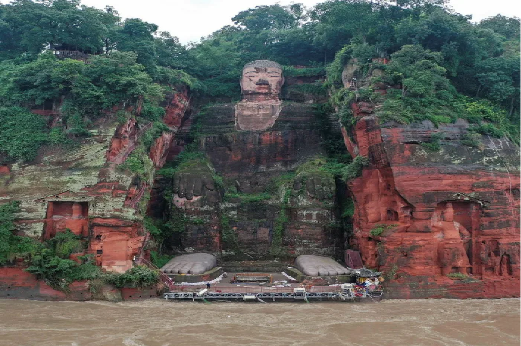 An aerial view of the Leshan Giant Buddha surrounded by floodwaters following heavy rains in Leshan in China’s southwestern Sichuan province © AFP/Getty 1900 buddha