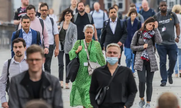 Commuters on London Bridge. Prof Sir Andrew Pollard, director of the Oxford Vaccine Group, said: ‘The Delta variant will still infect people who have been vaccinated.’ Photograph: Guy Bell/REX/Shutterstock Commuters on London Bridge. Prof Sir Andrew Pollard, director of the Oxford Vaccine Group, said: ‘The Delta variant will still infect people who have been vaccinated.’ Photograph: Guy Bell/REX/Shutterstock