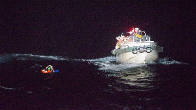 Coast guards rescuing a Filipino man off Amami Oshima island in the East China Sea on Wednesday.10th Regional Coast Guard Headquarters / AFP - Getty Images 3436 sea 1