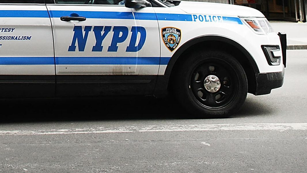 new york city police officer charged of acting as illegal agent china