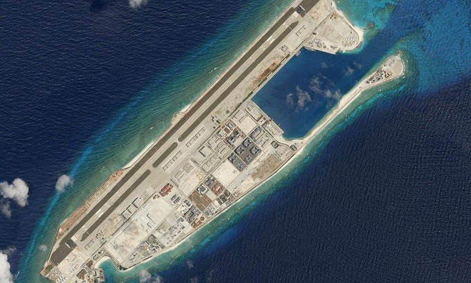 Satellite photo dated March 19, 2018 shows Fiery Cross Reef. Photo by Planet Labs Inc/Handout via Reuters. 0741 cross