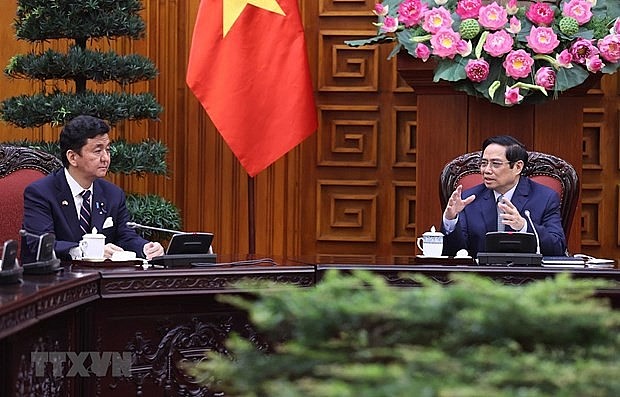 Prime Minister Pham Minh Chinh (R) receives Japanese Defence Minister Kishi Nobuo (Photo: VNA) Prime Minister Pham Minh Chinh (R) receives Japanese Defence Minister Kishi Nobuo (Photo: VNA)