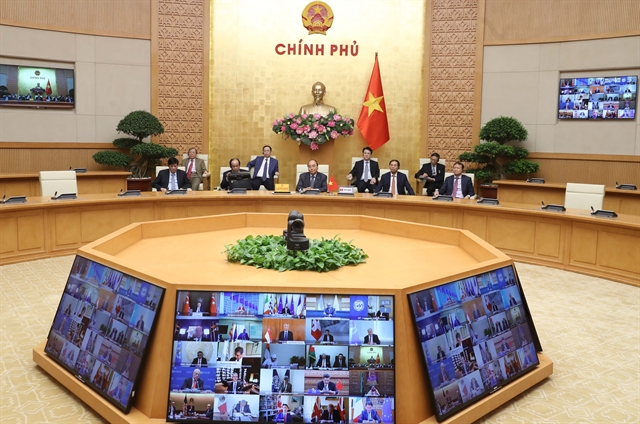 Prime Minister Nguyễn Xuân Phúc attended the G20 emergency video summit on Thursday during which leaders of the 20 major economies discussed coordinated responses to the widening COVID-19 pandemic. 4049 phuc 2