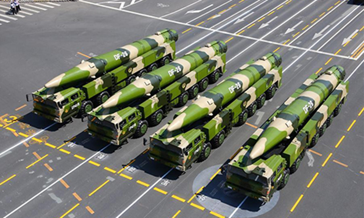 File photo taken on Sept. 3, 2015 shows DF-26 missiles attending a military parade in Beijing, capital of China. It has been a big year for China's military as the People's Liberation Army (PLA) is to celebrate its 90th birthday. As Aug. 1, the birthday of the PLA, approaches, the country's army has shown how much its military capacity has grown and how committed it is to maintaining world peace. The PLA has come a long way since its birth during the armed uprising in the city of Nanchang on August 1, 1927, when it had only 20,000 soldiers. Ninety years later, the country boasts 2 million servicemen, according to a national defense white paper titled UK, India plan to deploy aircraft carriers against China
