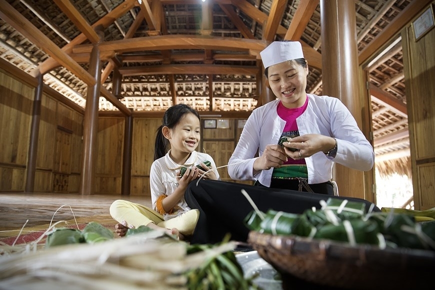 春节芒族人做的传统饼。(图源:Toquoc.vn) 春节芒族人做的传统饼。(图源:Toquoc.vn)