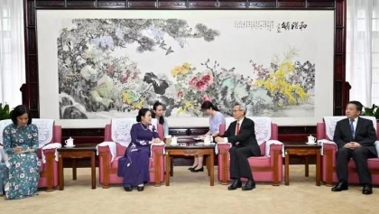越南友好组织联合会主席会见中国人民对外友好协会会长
