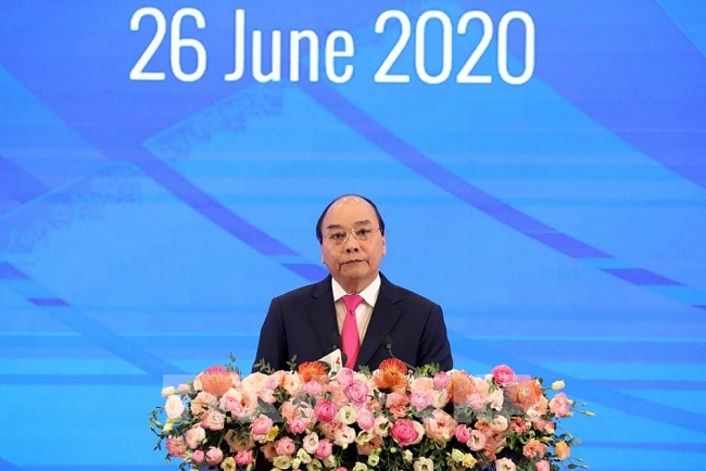 Thủ tướng Nguyễn Xuân Phúc, Chủ tịch ASEAN 2020 phát biểu khai mạc hội nghị (Ảnh: Thống Nhất/TTXVN) 1028 092253 asean 2020 khai mac hoi nghi cap cao asean lan thu 36