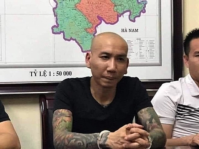 Phú Lê tại cơ quan Công an (Ảnh: CAND) 2902 d057247c 089c 4cb2 ba60 a9db4cba3557