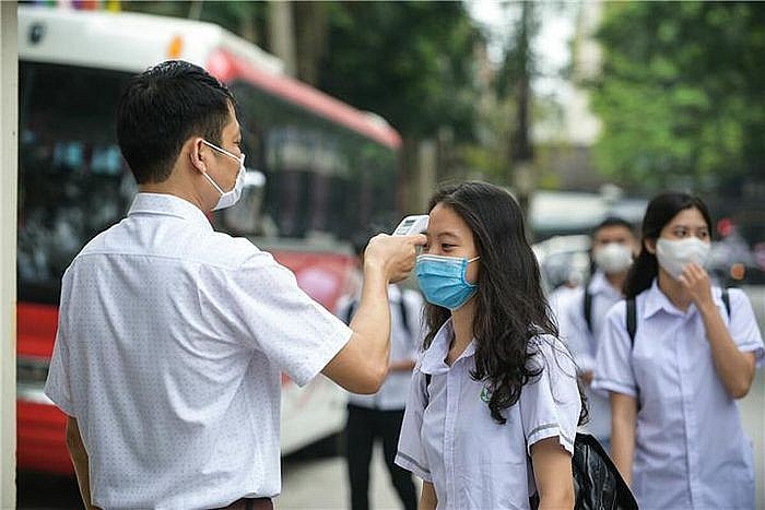 Việc tổ chức dạy học trực tiếp phải đảm bảo an toàn phòng chống dịch COVID-19 (Ảnh minh họa) Việc tổ chức dạy học trực tiếp phải đảm bảo an toàn phòng chống dịch COVID-19 (Ảnh minh họa)