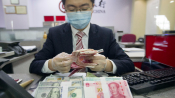 全球已有70多个央行或货币当局将人民币纳入外汇储备