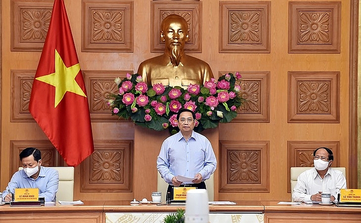 លោកនាយករដ្ឋមន្រ្តី Pham Minh Chinh ដឹកនាំកិច្ចប្រជុំទូទាំងប្រទេសរបស់រដ្ឋាភិបាលដើម្បីផ្ទៀងស្ដាប់ ចែករំលែក ដោះស្រាយការលំបាក ជំរុញផលិតកម្ម អាជីវកម្មសម្រាប់អង្គភាពអាជីវកម្មក្នុងបរិបទនៃជម្ងឺកូវីដ ១៩។ (រូបថត៖ VGP)