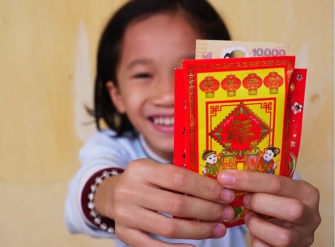 New small banknotes hunted for New Year lucky money in Vietnam New small banknotes hunted for New Year lucky money in Vietnam
