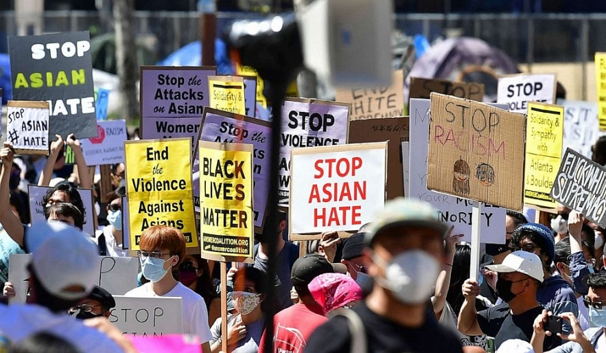 Social activists gather for a demonstration denouncing anti-Asian American and Pacific Islander sentiment and hate at City Hall in Los Angeles, March 27, 2021. Frederic J. Brown/AFP via Getty Images. 1610-asian-3