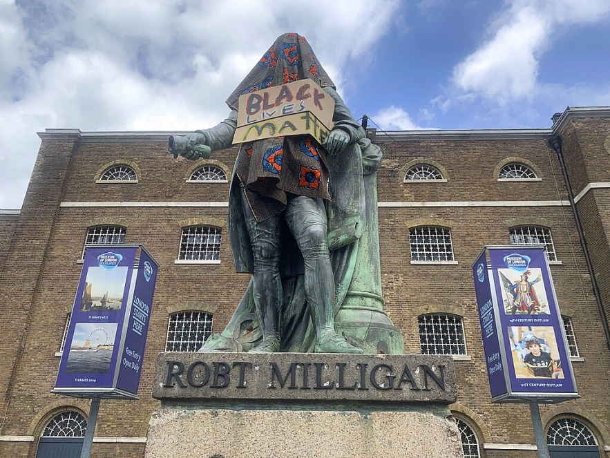 George Floyd protests spread worldwide causing UK's slave trader's statue outside London museum removed uk removes slave traders statue from outside london museum