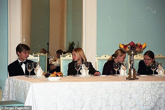 Pictured left to right: Alexander Pugachev, Katerina and Maria Putina, and Viktor Pugachev at Russian billionaire Sergei Pugachev's country house in the early 2000s. Photo: Daily Mail 0356 putin daughter 3
