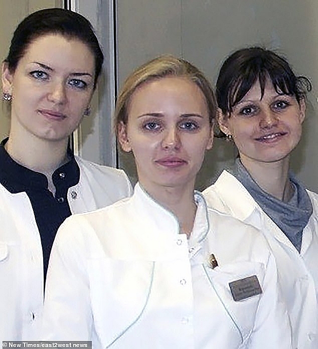 Maria, pictured centre, is believed to be married to a Dutch businessman with whom she has a family, making Putin a grandfather. Photo: Daily Mail 1502 putin daughter 8