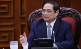 ທ່ານ​ນາ​ຍົກ​ລັດ​ຖະ​ມົນ​ຕີ ຟ້າມ​ມິງ​ຈິງ ໃຫ້​ການ​ຕ້ອນ​ຮັບ​ທ່ານ​ເອກ​ອັກ​ຄະ​ລັດ​ຖະ​ທູດ ຈີນ ປະ​ຈຳ ຫວຽດ​ນາມ