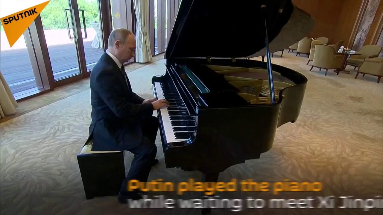 tong thong nga putin tro tai danh dan bang piano cua chu tich tap can binh