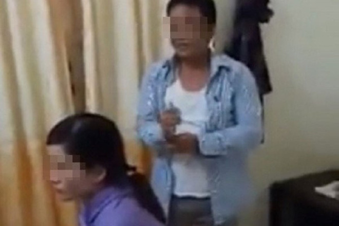 truong cong an xa vao nha nghi cung vo nguoi khac bi bat gap luc dang trong gio lam viec