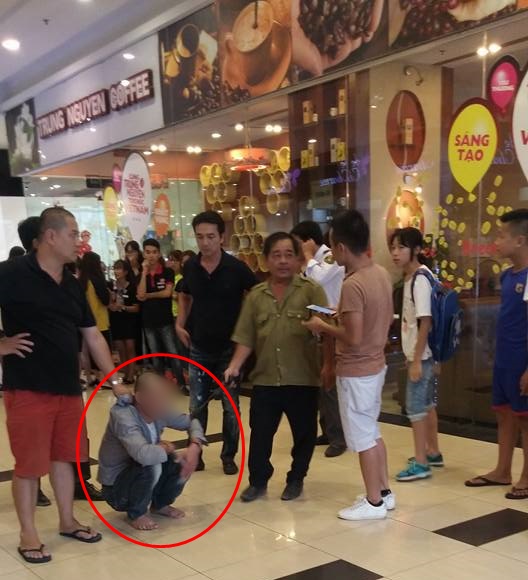 cong an dang dieu tra clip bao ve sieu thi o quan long bien bi nguoi dan bat giu vi quay roi thieu nu