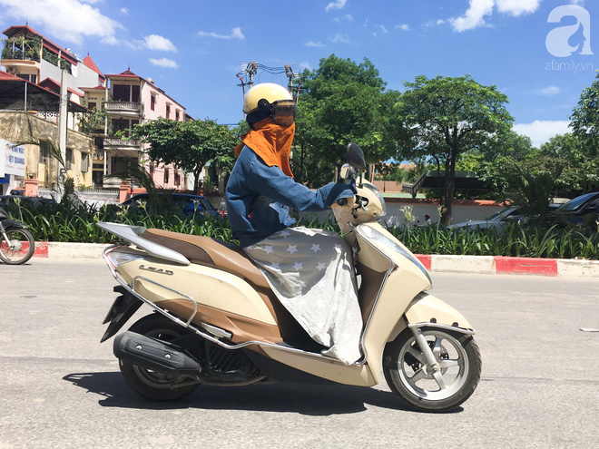 nang nong hon 40 do c nguoi dan ha noi chat vat tranh nang tu sang som