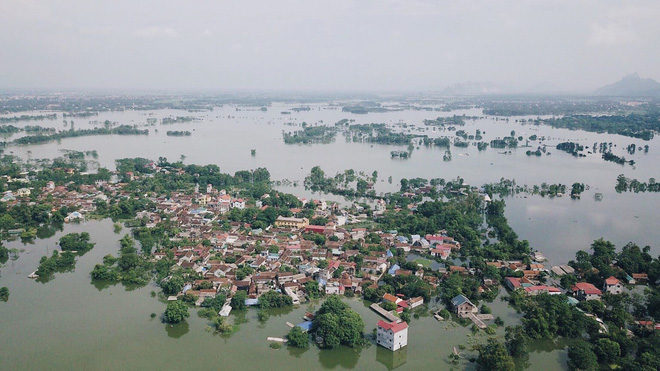 1 nguoi lon va 2 tre em say chan duoi nuoc trong vung ngap lut o ha noi