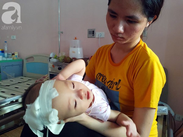 cha ngheo tha huong cuu con gai 14 thang tuoi nam vien tu luc lot long vi can benh quai ac