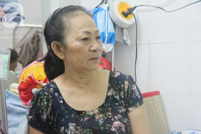 phep mau den voi nguoi me xin com tu thien nuoi con trai liet nua nguoi suot 2 nam troi trong benh vien