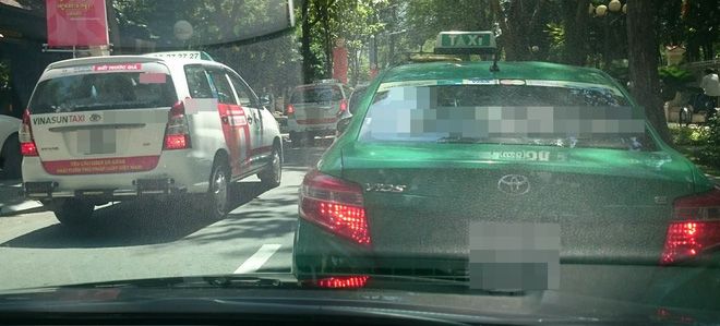 hang loat taxi o sai gon dan decal phan doi uber va grab dai dien vinasun noi tai xe tu phat nhung khau hieu khong den noi qua dang