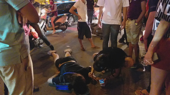 ha noi co gai di xe may bi o to co vuot den do dam trong thuong
