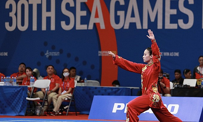 Gold medalist Tran Thi Minh Huyen performs tai chi at SEA Games 30 on December 1, 2019. Photo: VnExpress Gold medalist Tran Thi Minh Huyen performs tai chi at SEA Games 30 on December 1, 2019. Photo: VnExpress