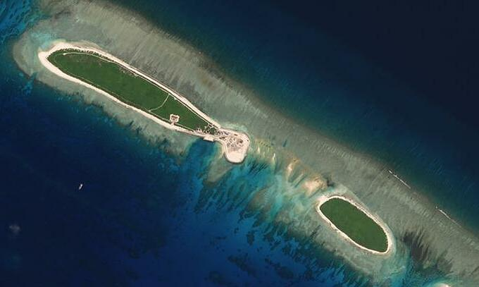 Satellite photo shows the North Island, part of the Paracel Islands group in the South China Sea, on September 29, 2017. Photo by Planet Labs/Handout via Reuters. 4212-bd1