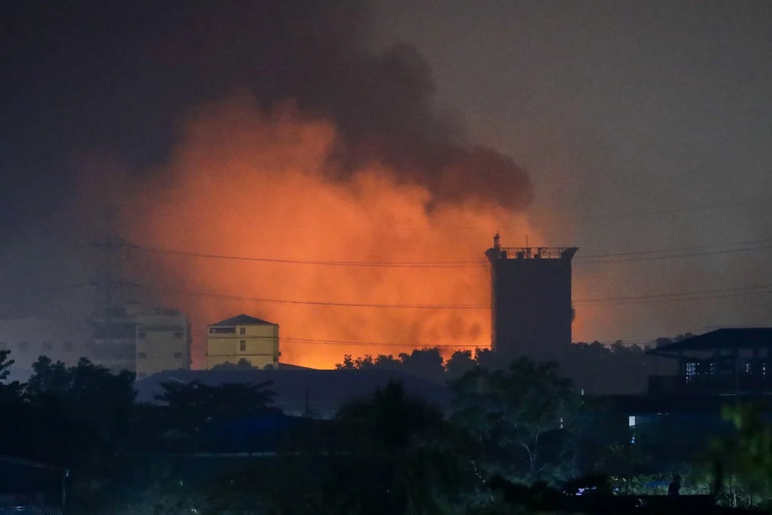 A fire burns at a Chinese-owned factory in Hlaingthaya township, on the outskirts of Yangon, Myanmar. Photo: EPA 5811-my3