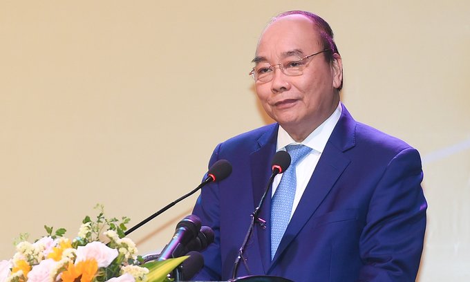 Prime Minister Nguyen Xuan Phuc speaks at a conference in Can Tho in March 2021. Photo by Vietnam Government Portal. 4353-pm1