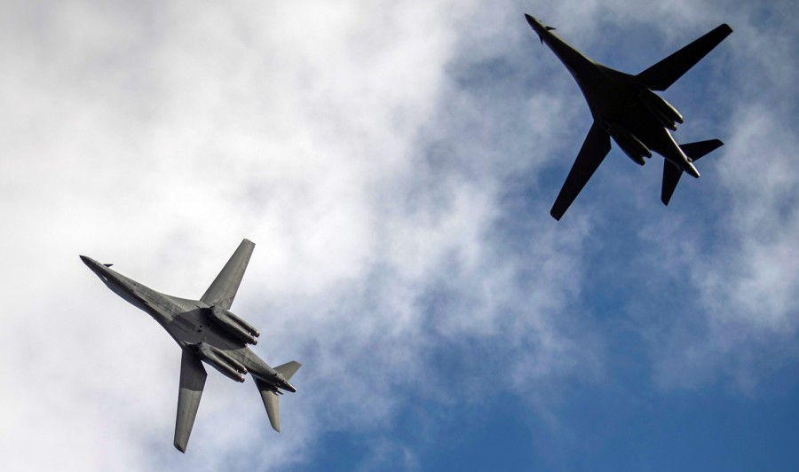 China deploys 2 aircraft carriers while the US's two Air Force B-1B Lancer bombers flying over the East Sea china deploys 2 aircraft carriers while the uss two air force b 1b lancer bombers flying over the east sea
