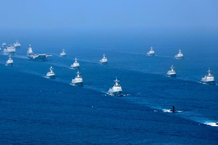 China deploys 2 aircraft carriers while the US's two Air Force B-1B Lancer bombers flying over the East Sea china deploys 2 aircraft carriers while the uss two air force b 1b lancer bombers flying over the east sea