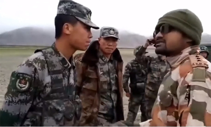 Chinese soldiers (left) and India (right) during a confrontation at the Field Control Line (LAC) in May. Photo: ANI. 2131 china