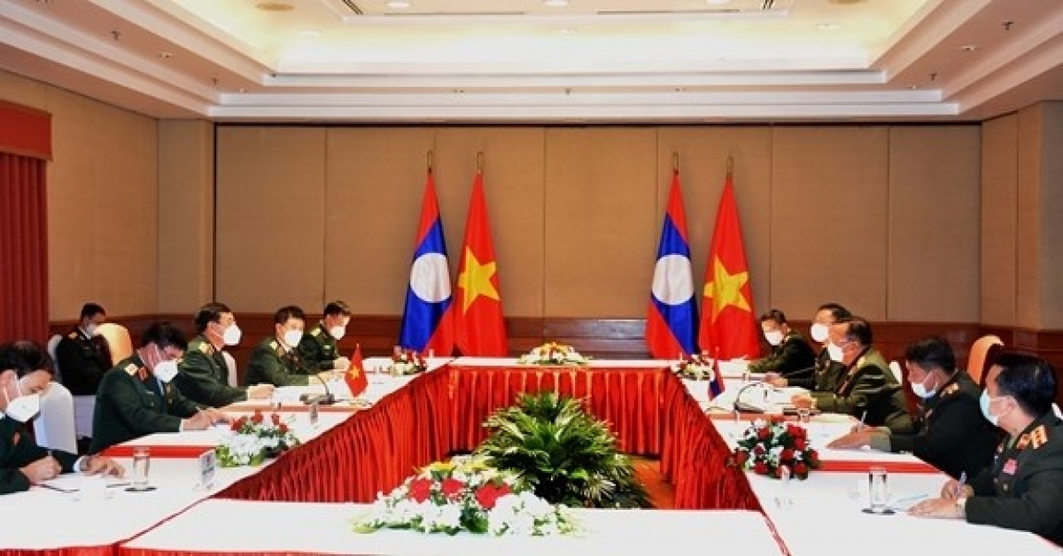 Vietnam, Laos discuss to promote mutual support and cooperation for defense Vietnam, Laos discuss to promote mutual support and cooperation for defense
