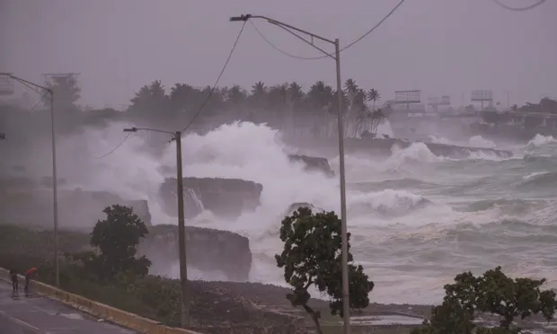 The winds of Elsa, the first hurricane of 2021 in the Atlantic basin, weakened and became a tropical storm again as it approached the island of Hispaniola, reported the US National Hurricane Center. Photograph: Orlando Barría/EPA The winds of Elsa, the first hurricane of 2021 in the Atlantic basin, weakened and became a tropical storm again as it approached the island of Hispaniola, reported the US National Hurricane Center. Photograph: Orlando Barría/EPA