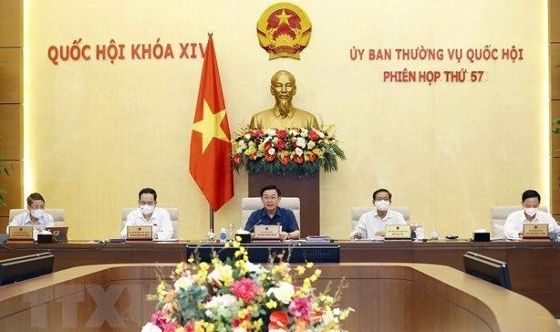 NA Chairman Vuong Dinh Hue (middle) chairs the 57th meeting of the NA Standing committee (Photo: VNA) NA Chairman Vuong Dinh Hue (middle) chairs the 57th meeting of the NA Standing committee (Photo: VNA)