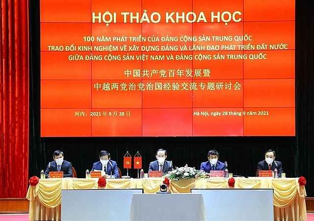 Vietnam and China co-host a symposium to share experience in Party building, national development. Vietnam and China co-host a symposium to share experience in Party building, national development.